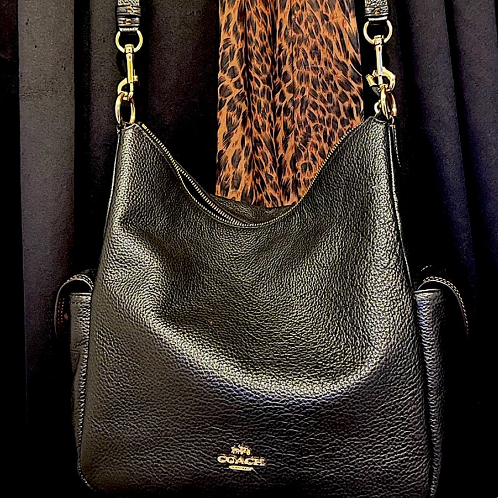 New black leather coach bag with out tags used 1 time  no flaws